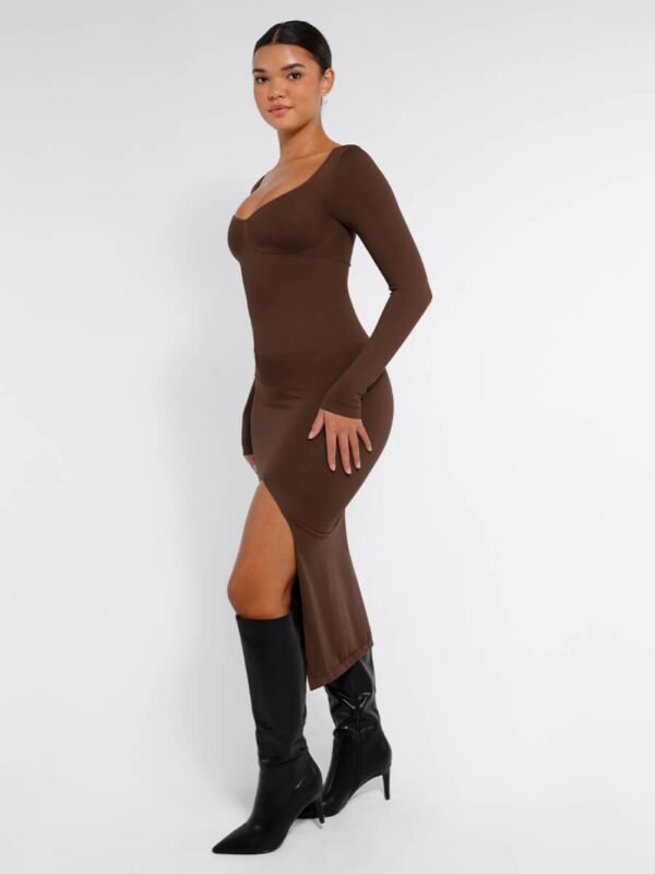 Woman wearing a form-fitting shaping dress with bust support and high side slit, showcasing tummy control and seamless design.