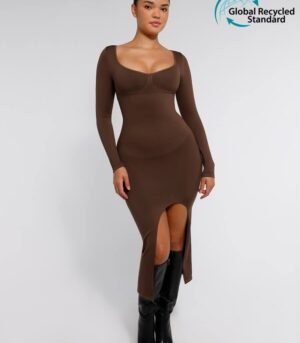Woman wearing a form-fitting shaping dress with bust support and high side slit, showcasing tummy control and seamless design.