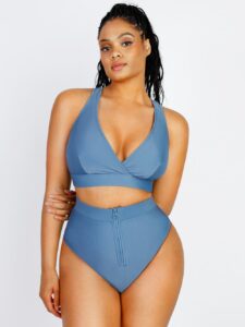 Woman wearing a fashionable surplice bikini top swimwear, crossed-front design
