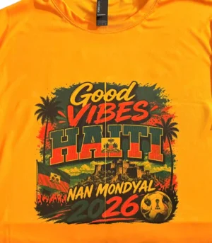 Good Vibes Haiti World Cup 2026 soccer fan t-shirt featuring Haitian flag colors, cheering fans, palm trees, historic fortress artwork, and football graphics.